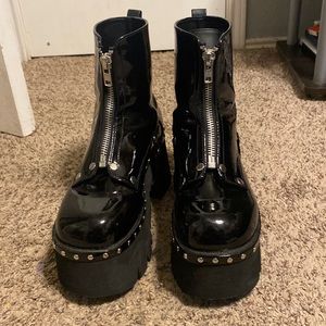 black and silver platforms. size 12, brand demonias